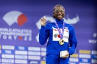 Melissa Jefferson-Wooden celebrates on the podium at the World Athletics Championships Tokyo 2025 - Source: Getty